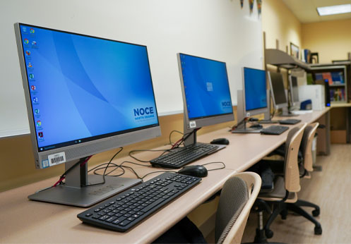 The computers located within the Anaheim Campus high school lab